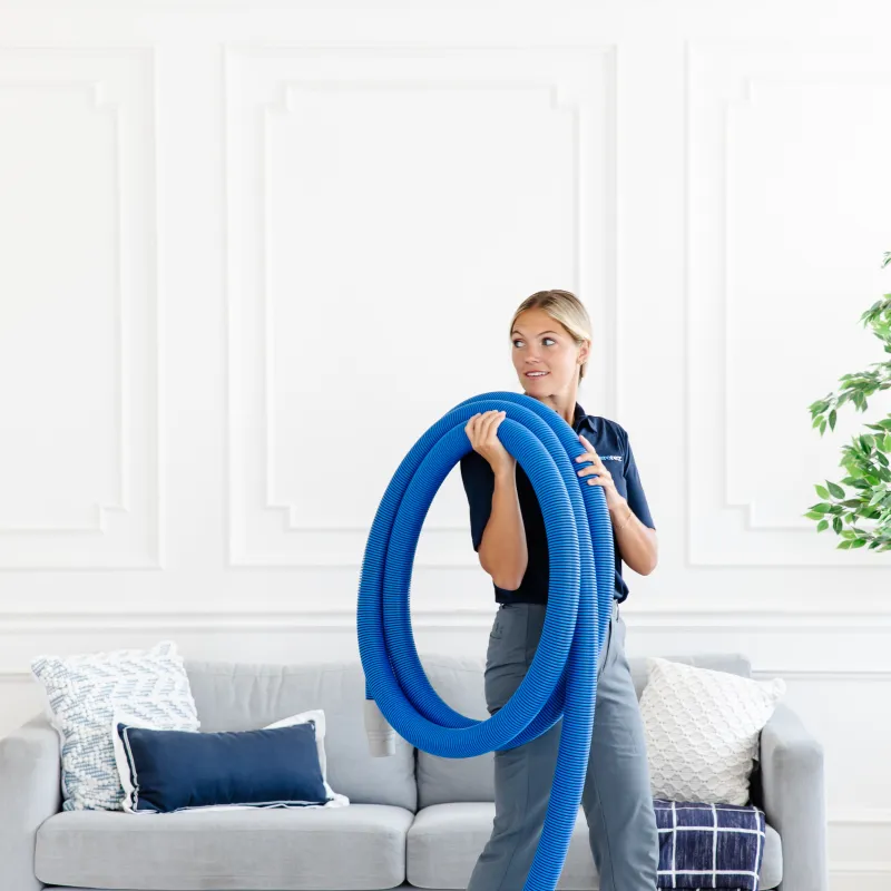 a person holding a blue object