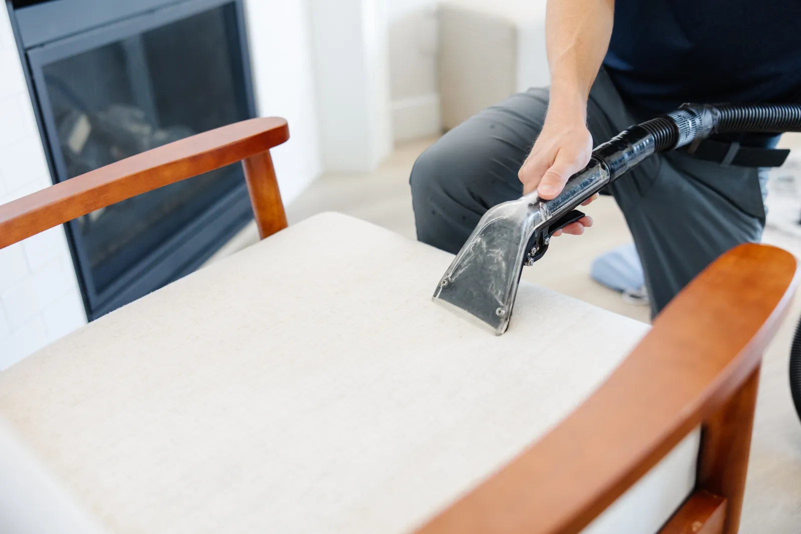 upholstery cleaning wand on chair